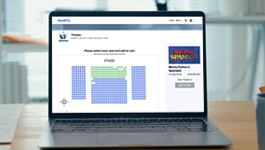 laptop with a seating chart on screen