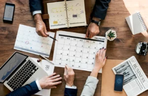 Event team planning dates around a calendar